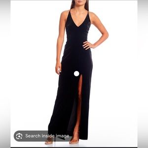 V-Neck front slit black long dress. Size 7/8, worn once. I’m perfect condition